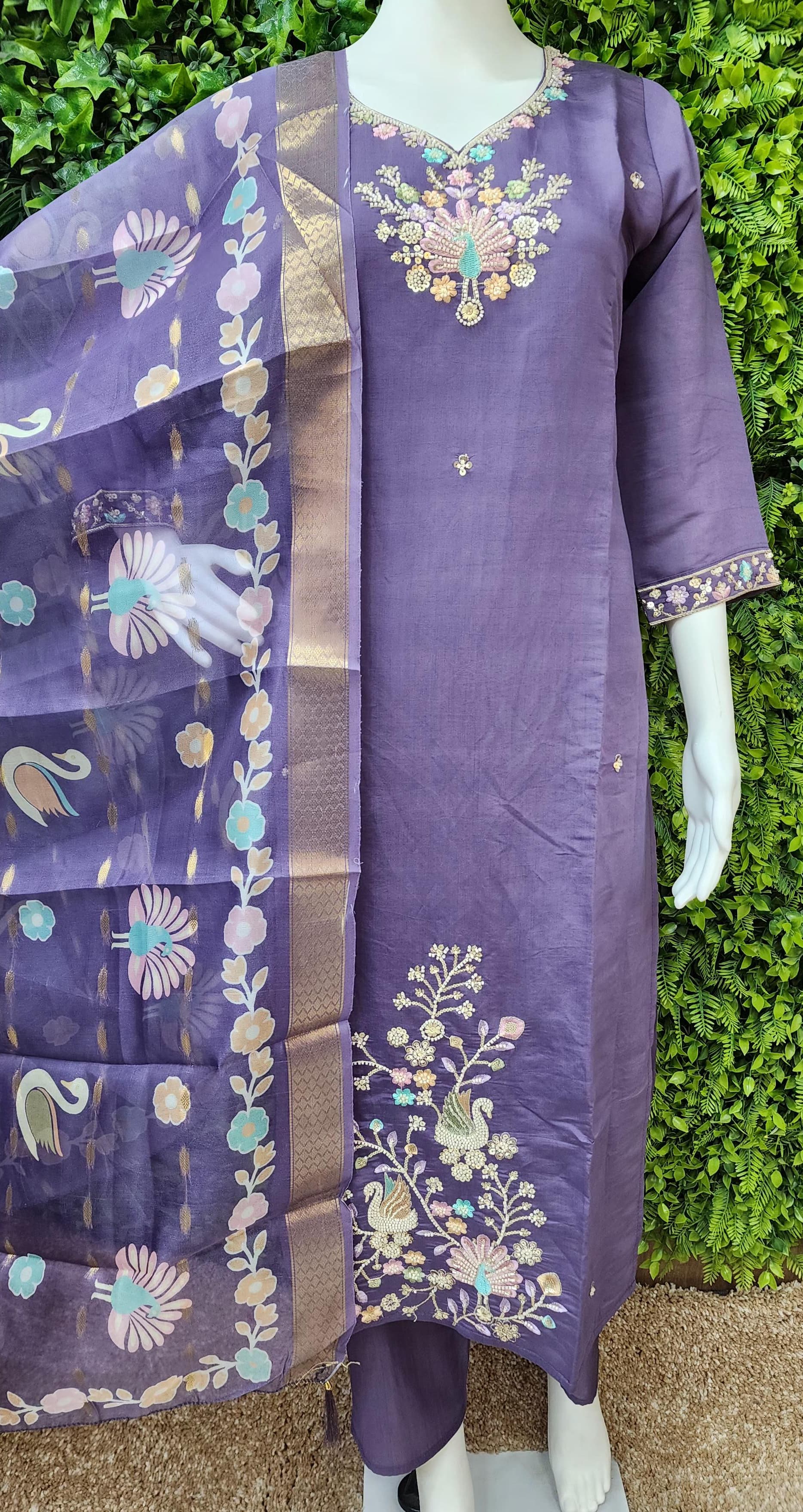 Roman peacock partywear