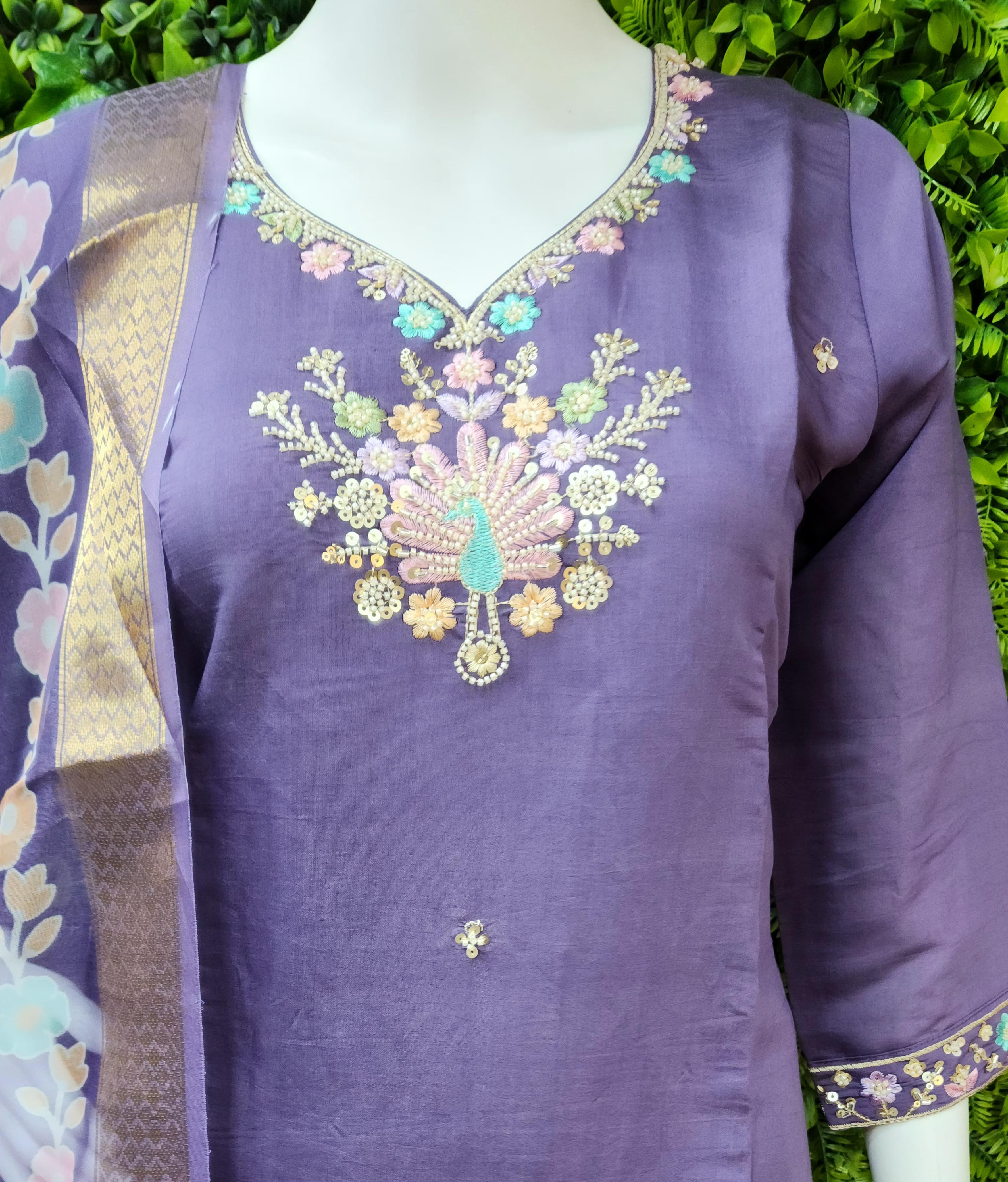 Roman peacock partywear