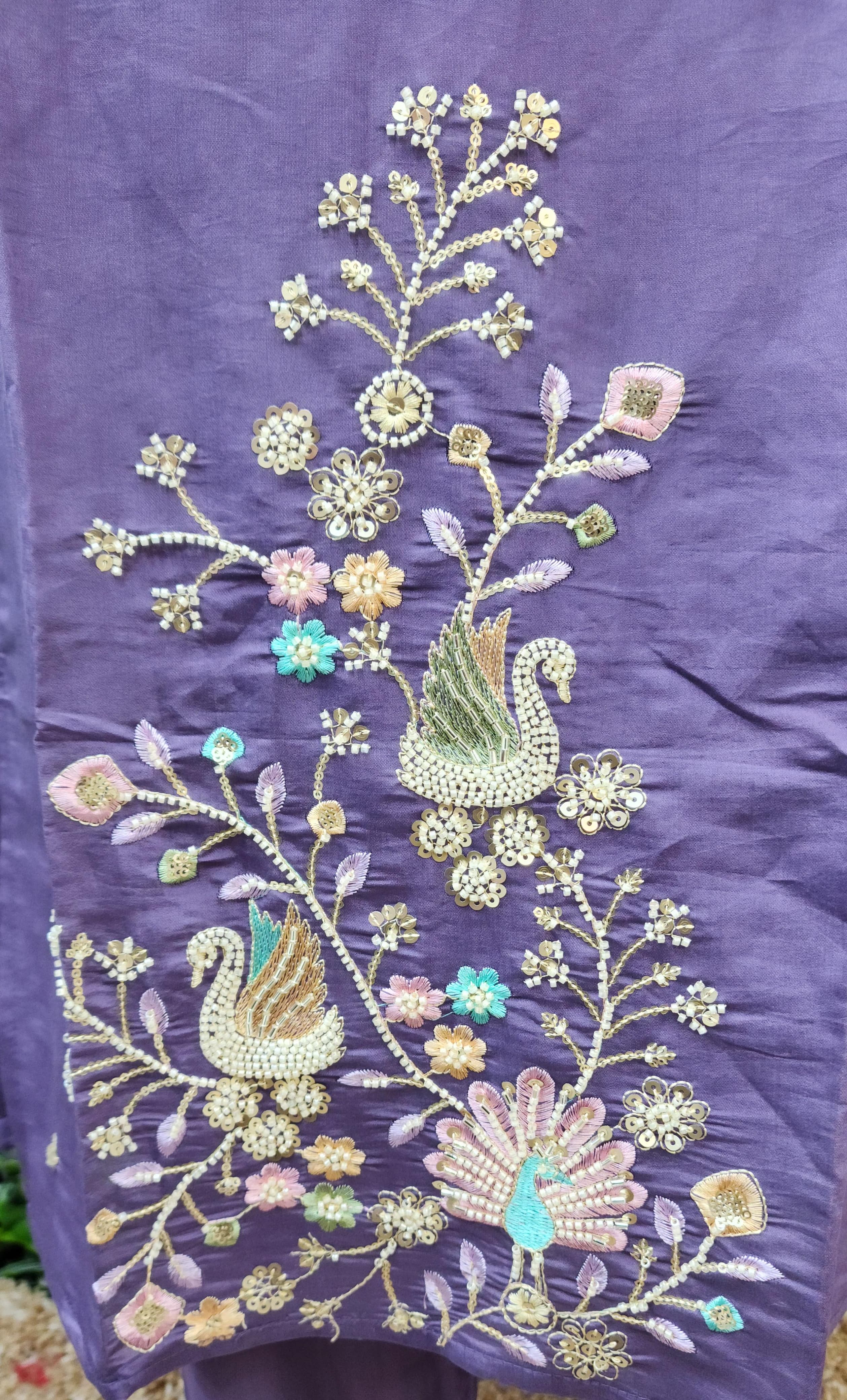 Roman peacock partywear